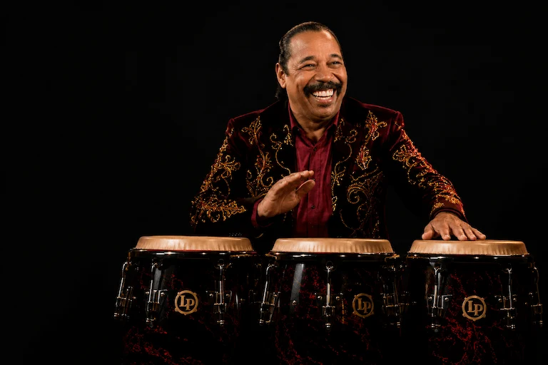 Victor Orlando performing on congas